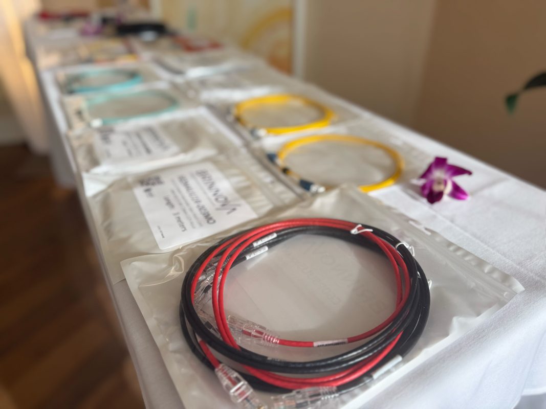 Inside the Presidential Suite at PTC 2026 Hawaii Waikiki with a AI Compatible Fiber Cable Showcase
